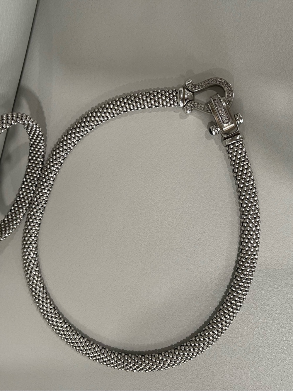 Sterling Silver Mesh Chain Necklace with diamond/onyx horseshoe clasp.